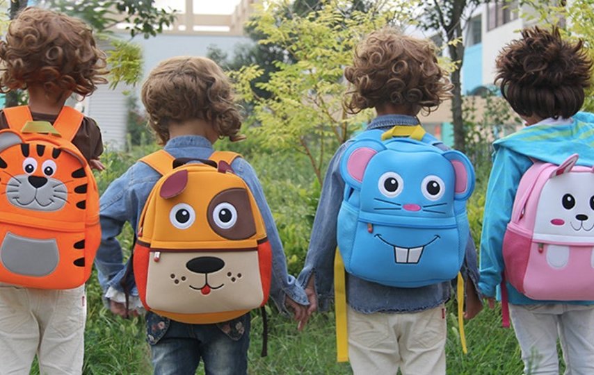 toddler wearing backpack